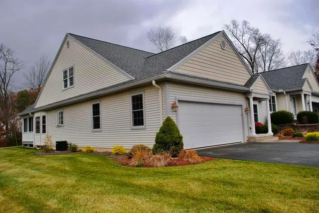 a view of a yard in front of a house