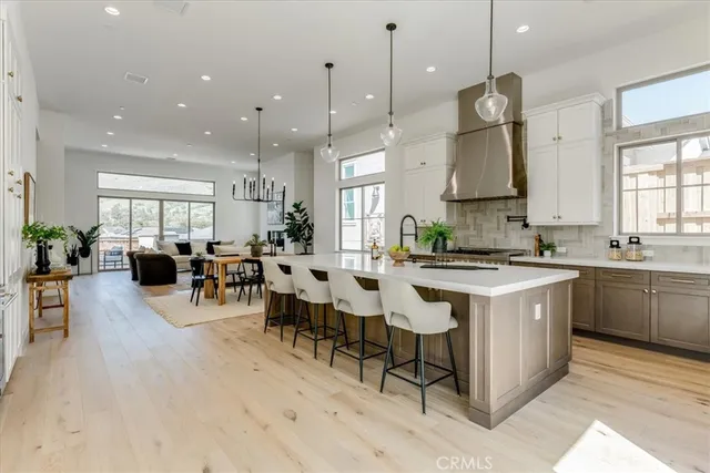 a kitchen with lots of counter space and sink