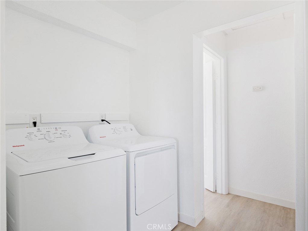38423 10th Place East, Unit 3 Palmdale, CA 93550 - Photo 17 of 27 a utility room with dryer and washer