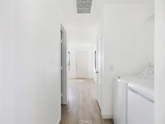 a view of balcony with wooden floor