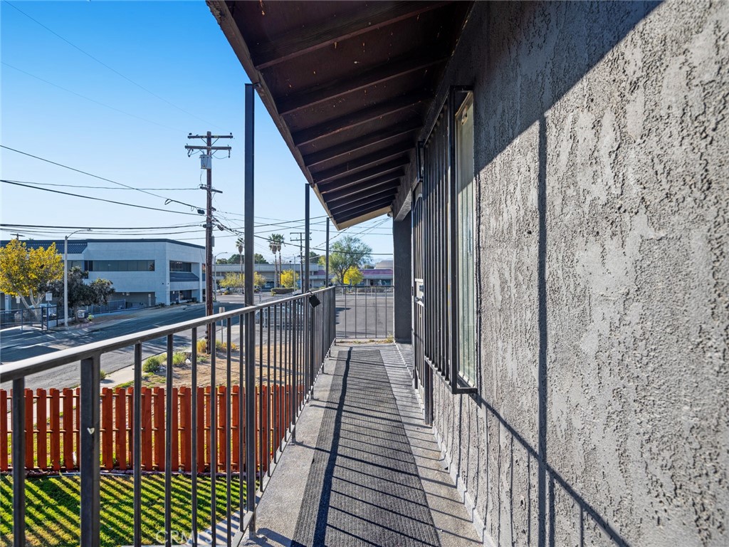 38423 10th Place East, Unit 3 Palmdale, CA 93550 - Photo 3 of 27 a view of balcony with wooden floor