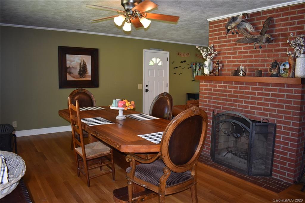 91 Country Club Road Tryon, NC 28782 - Photo 6 of 24 a dining room with furniture and window