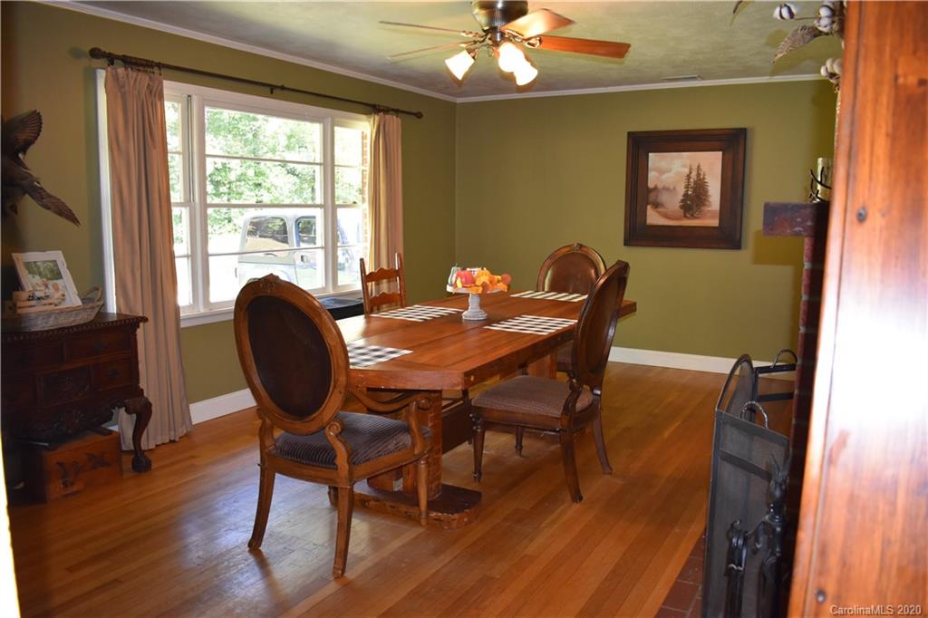 91 Country Club Road Tryon, NC 28782 - Photo 7 of 24 a dining room with furniture and window