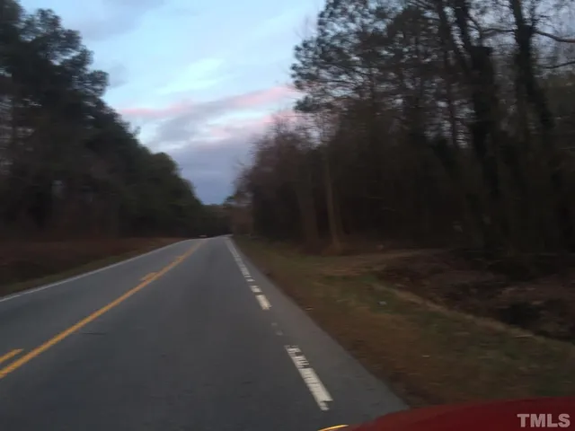 a view of balcony and yard