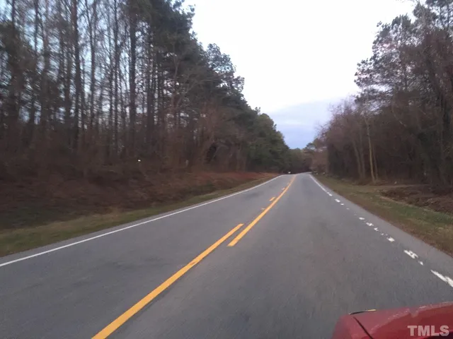 a view of a city street from a balcony