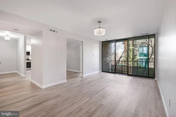 a view of entryway with wooden floor