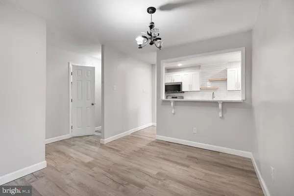 a view of a kitchen and a sink
