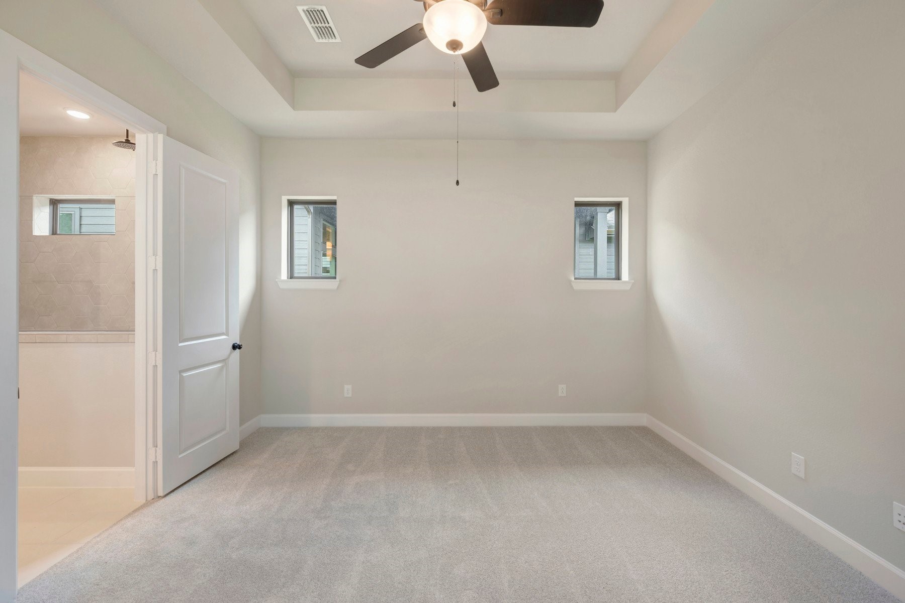 2722 Cottage Place Rosharon, TX 77583 - Photo 35 of 50 an empty room with a ceiling fan and a window