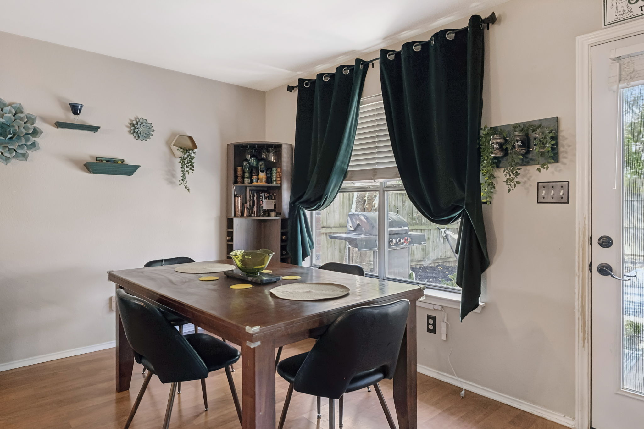 2412 Chestnut Path Round Rock, TX 78664 - Photo 9 of 26 Hard floors and ample natural light define this inviting dining space.