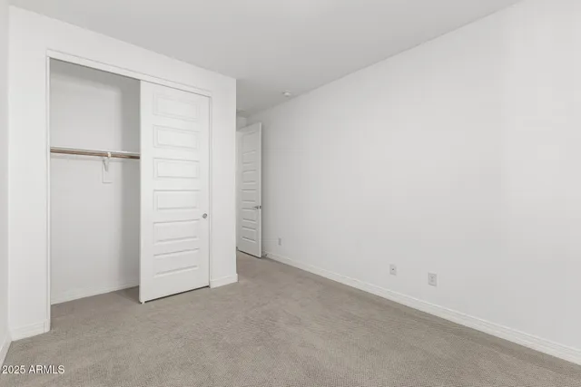 an empty room with closet