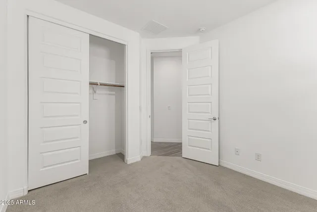 an empty room with closet