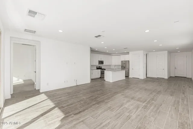 a view of kitchen with wooden floor