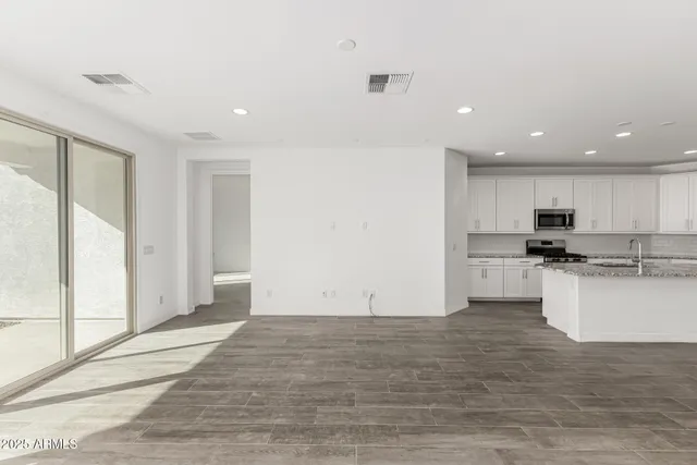 a view of kitchen with wooden floor