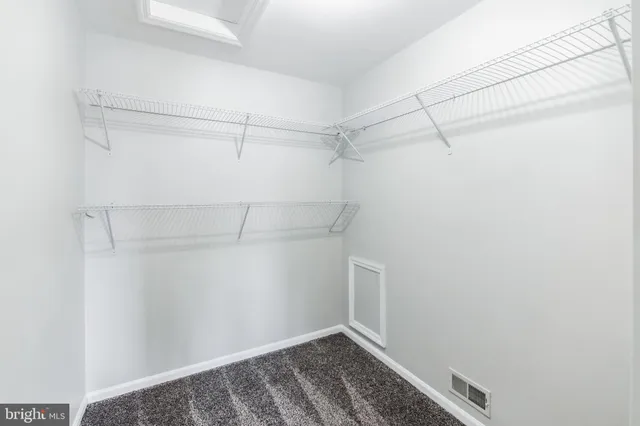 a view of a room with racks on the wall