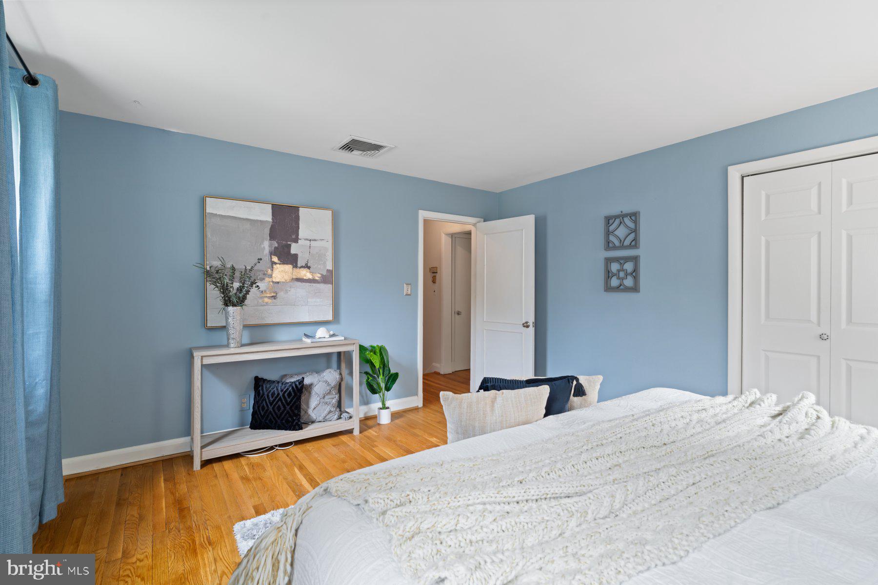 540 Brook Road Towson, MD 21286 - Photo 19 of 37 a bedroom with a bed and a fireplace