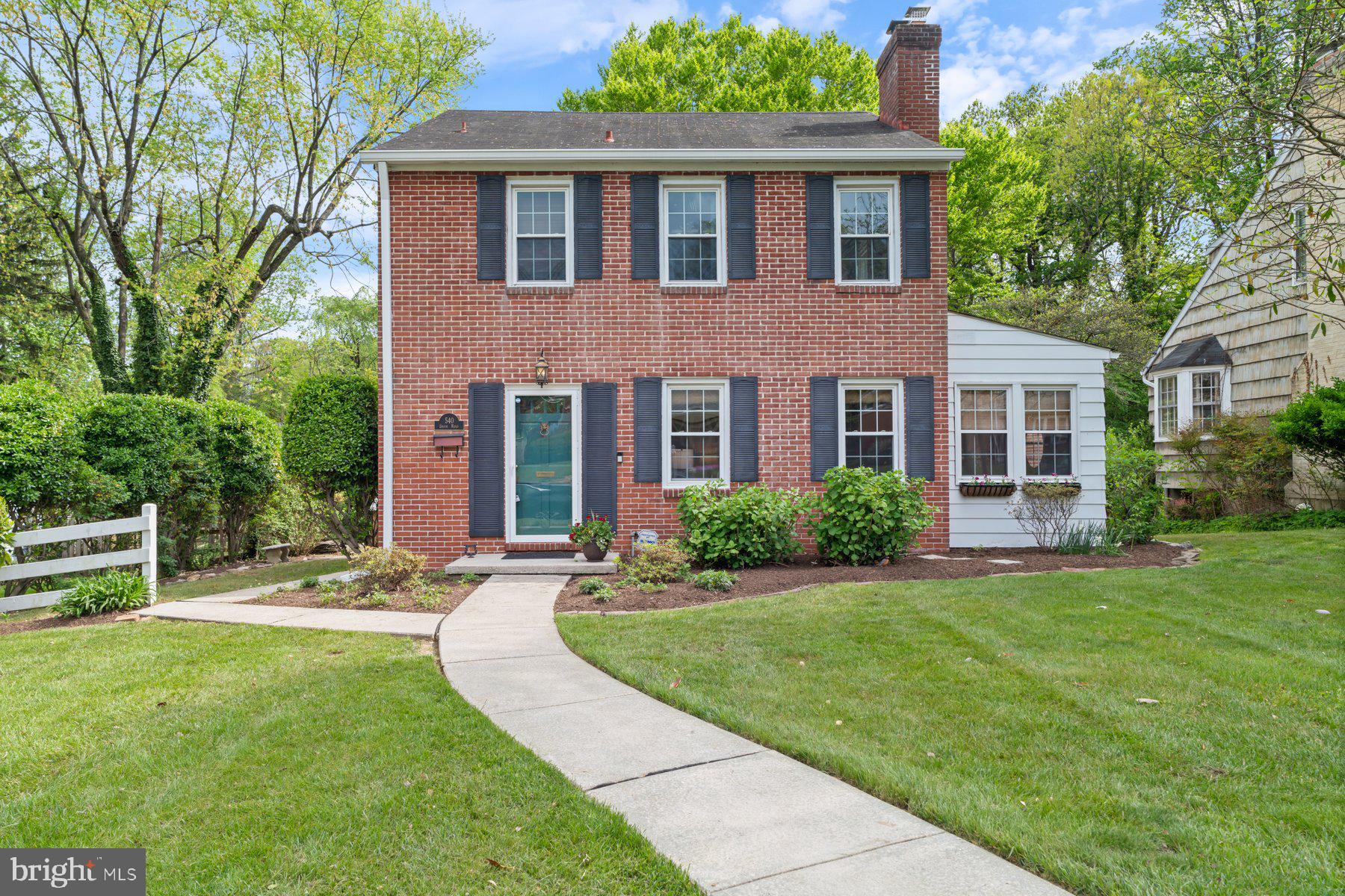 540 Brook Road Towson, MD 21286 - Photo 2 of 37 a front view of a house with a yard