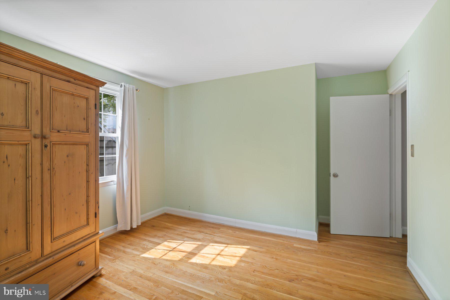 540 Brook Road Towson, MD 21286 - Photo 23 of 37 a view of empty room with wooden floor
