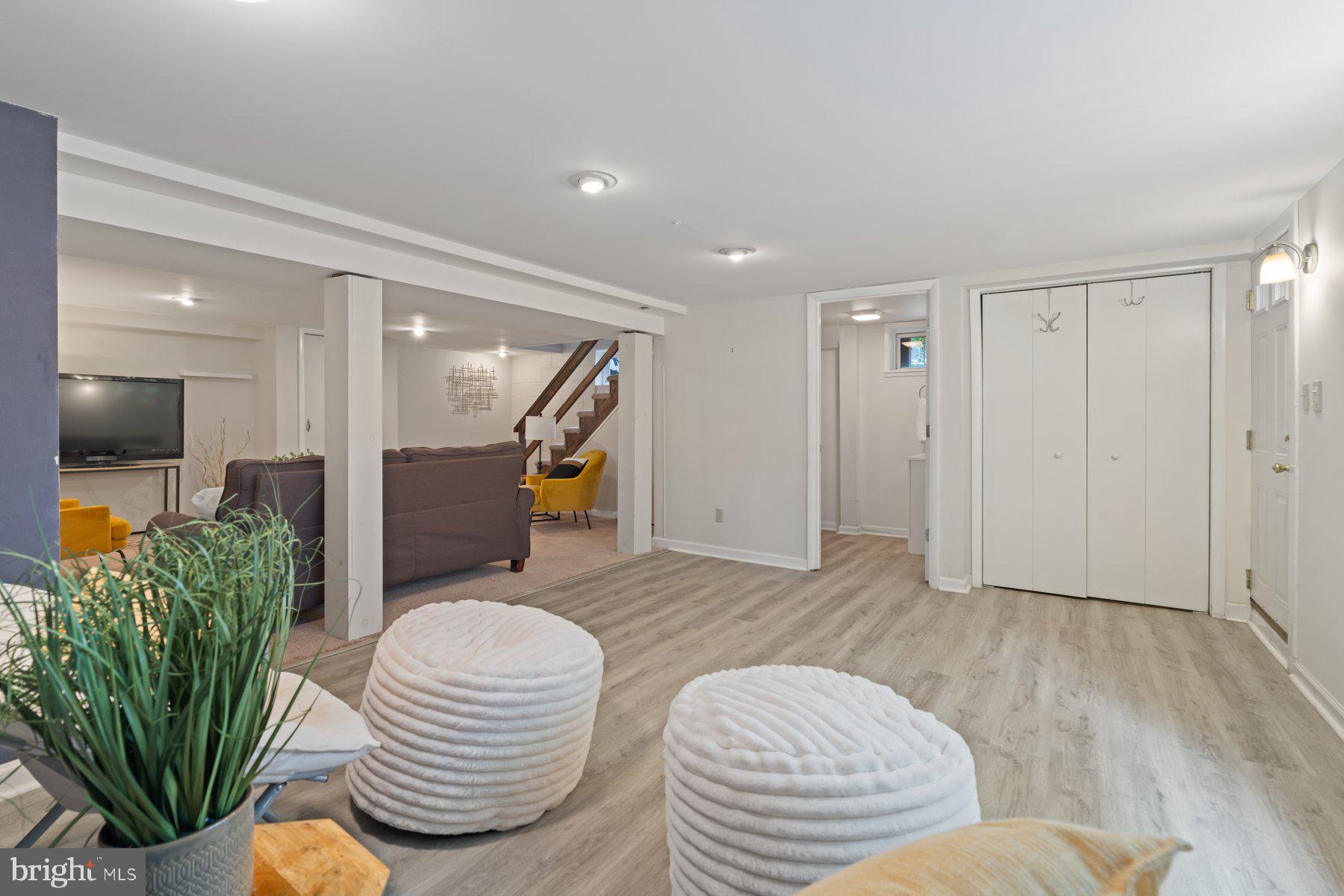 540 Brook Road Towson, MD 21286 - Photo 30 of 37 a living room with furniture and a potted plant