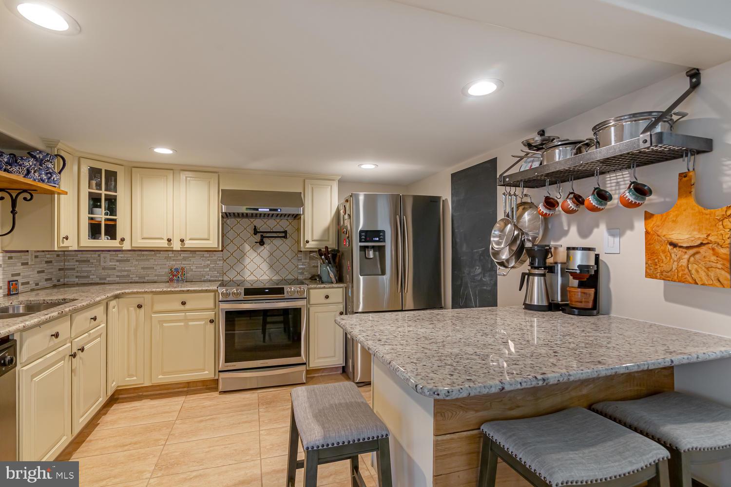 512 North Mill Road Kennett Square, PA 19348 - Photo 3 of 38 Updated Kitchen with Breakfast Bar