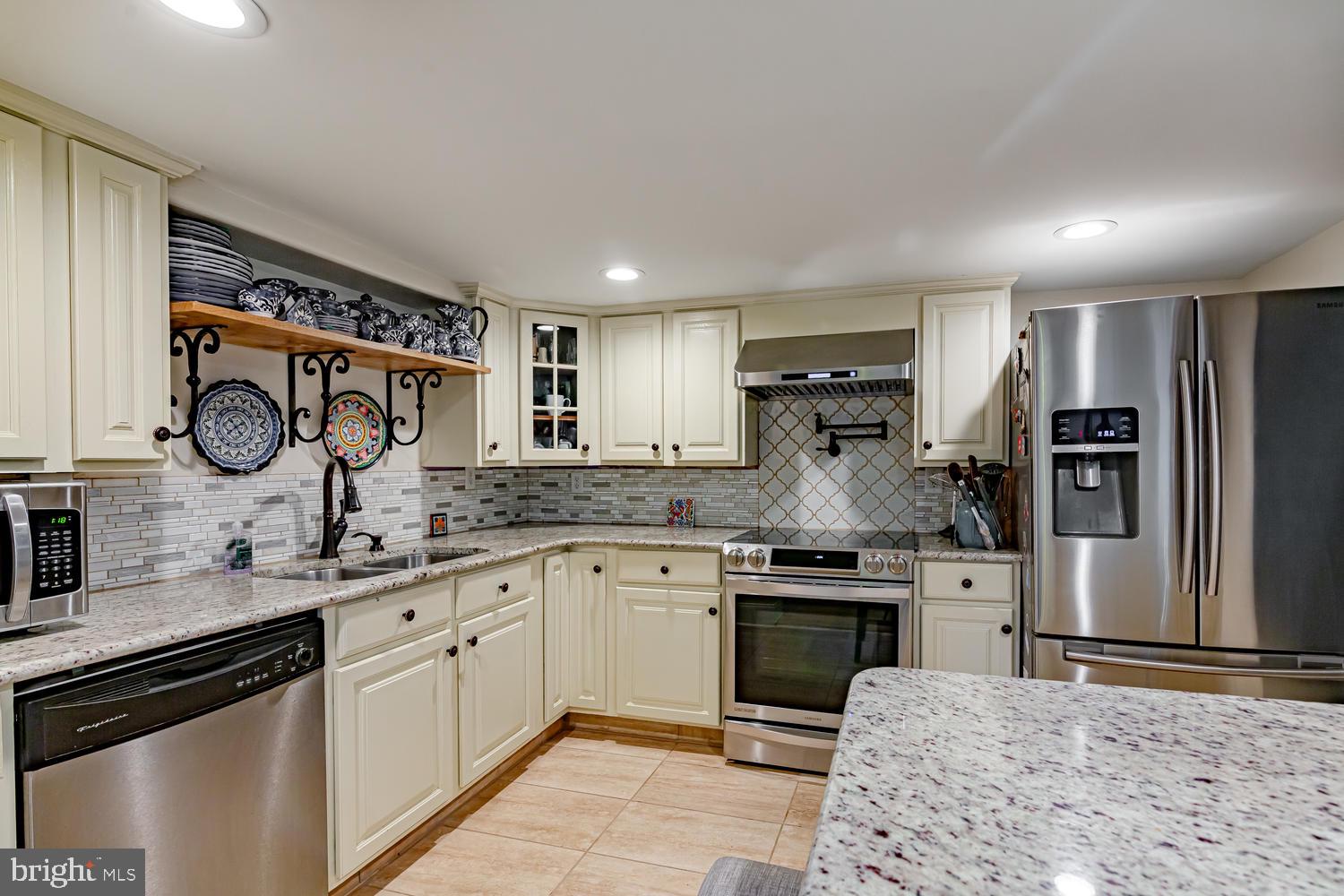 512 North Mill Road Kennett Square, PA 19348 - Photo 4 of 38 Kitchen With Granite and Stainless Appliances