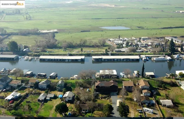 a room with lots of potted plants