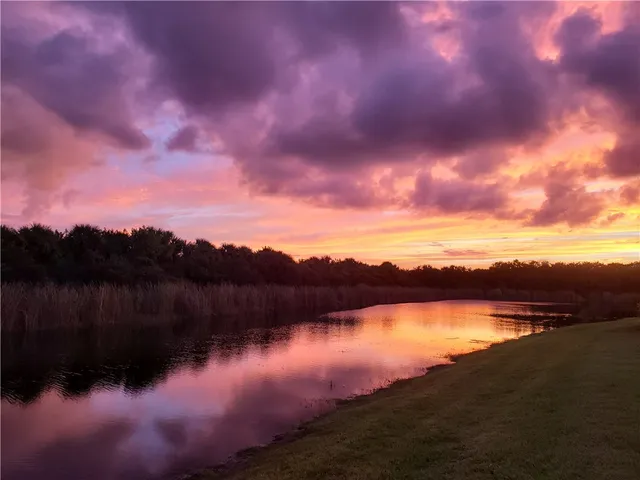 a view of lake with mountain