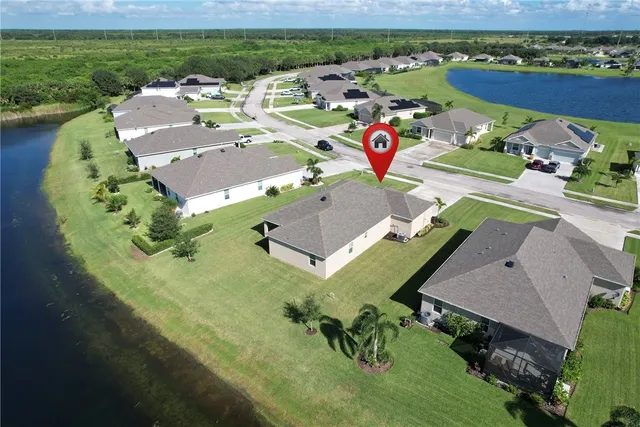 an aerial view of a house with a garden
