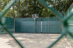 92 Cardinal Lane, Unit 92 Islip, NY 11751 - Photo 32 of 36 a view of a backyard