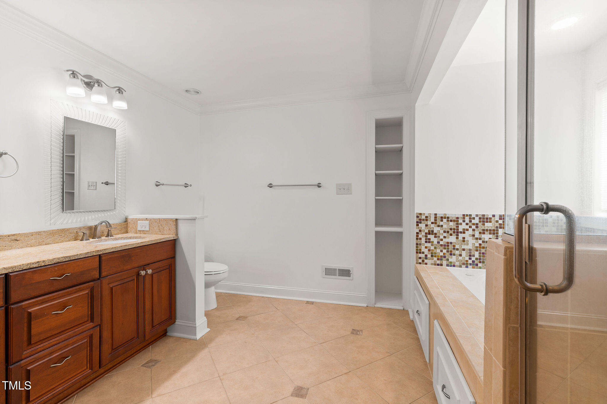 6131 Yellowstone Drive Durham, NC 27713 - Photo 15 of 29 a bathroom with a granite countertop sink and a mirror