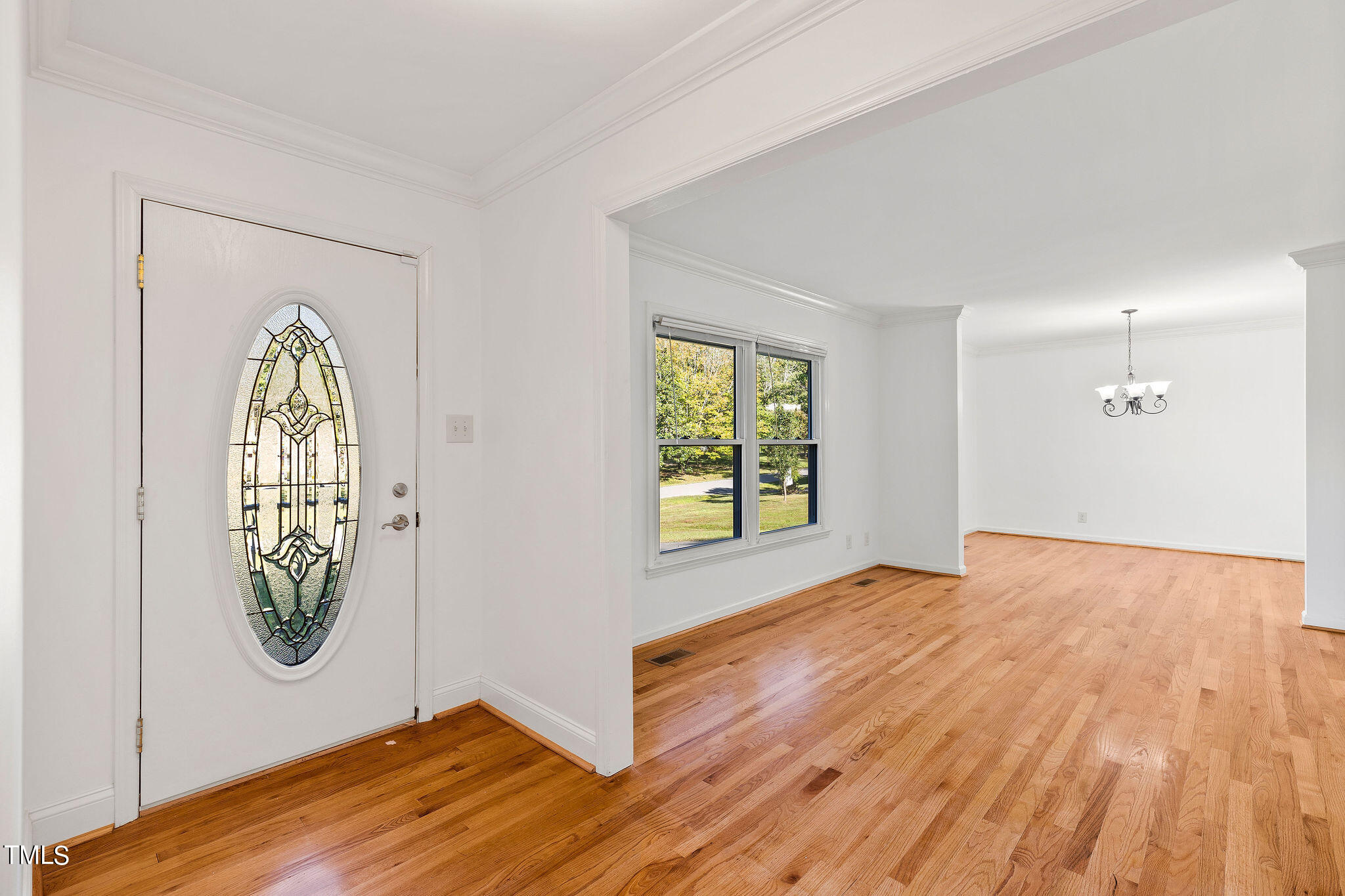 6131 Yellowstone Drive Durham, NC 27713 - Photo 26 of 29 an empty room with windows and mountain view