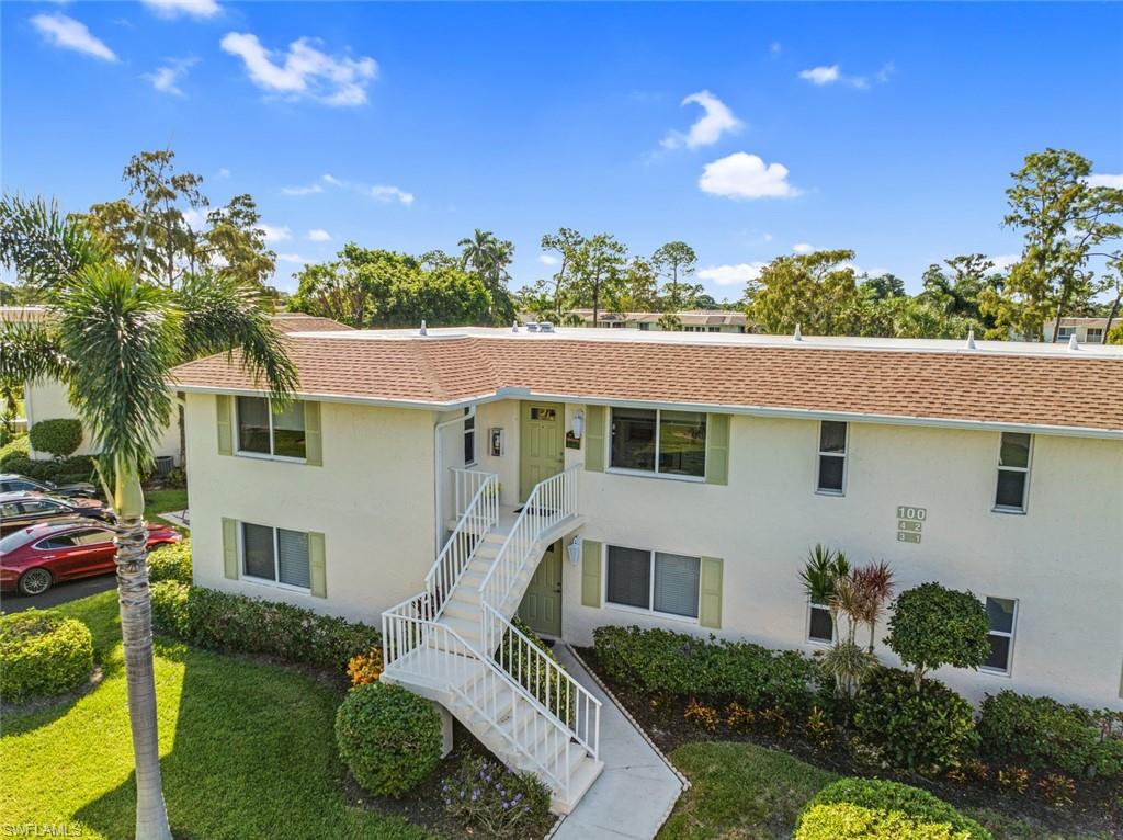100 Winding Way, Unit 4 Naples, FL 34112 - Photo 2 of 50 Elevated view of frontcondo upper left side