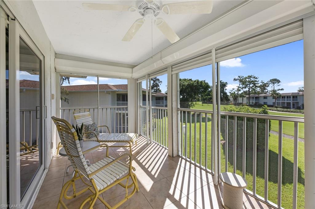 100 Winding Way, Unit 4 Naples, FL 34112 - Photo 31 of 50 Lanai view looking down the 17th Fairway