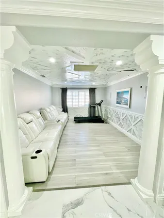 a large white bed in a white room