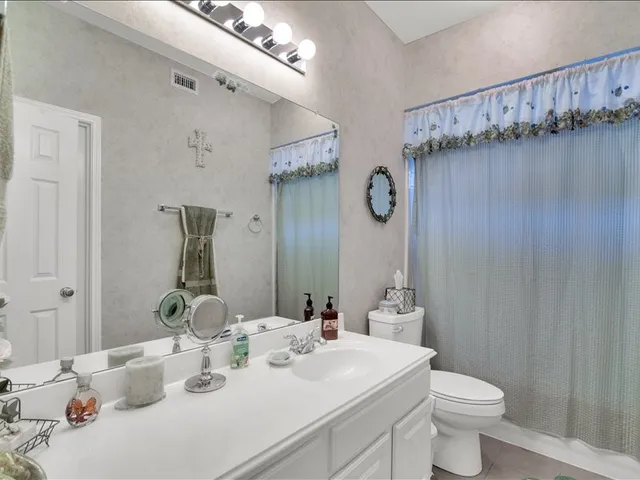 a view of a livingroom with furniture and toys