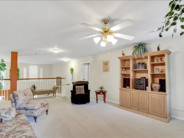 a living room with furniture and window