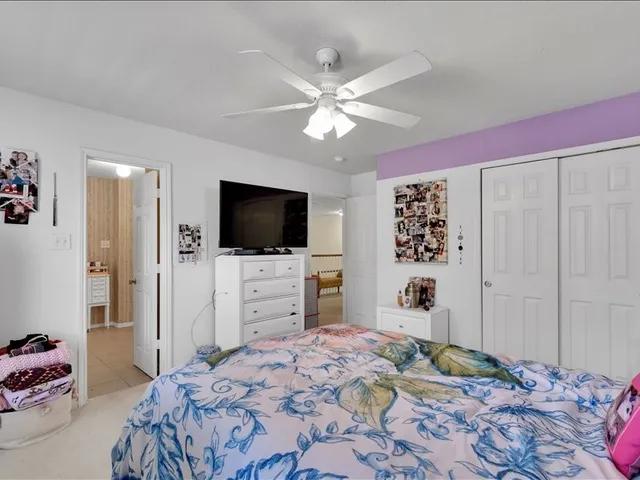 a view of a chairs and table in a patio