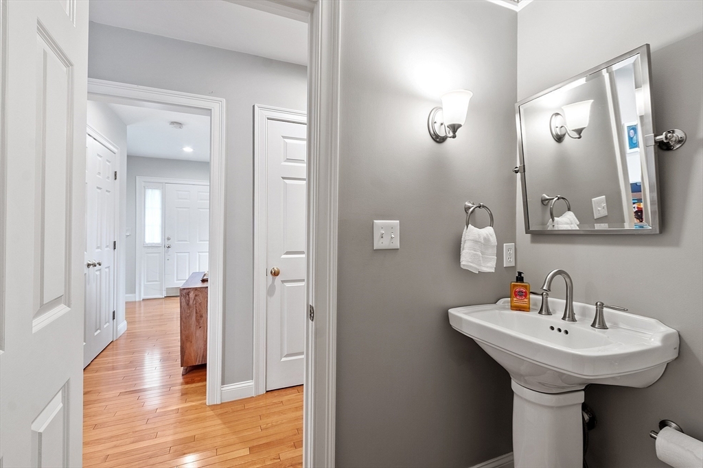 35 Lancaster County Road, Unit 7C Harvard, MA 01451 - Photo 13 of 33 a bathroom with a sink and a mirror