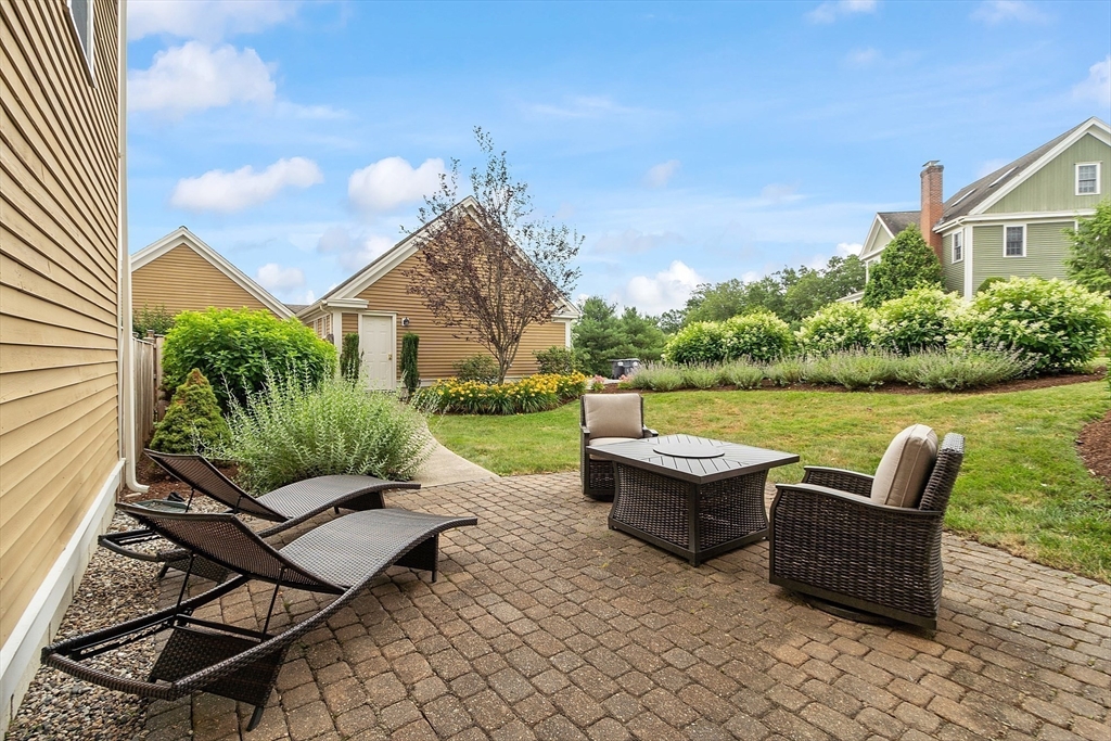 35 Lancaster County Road, Unit 7C Harvard, MA 01451 - Photo 29 of 33 a view of a patio with garden and patio