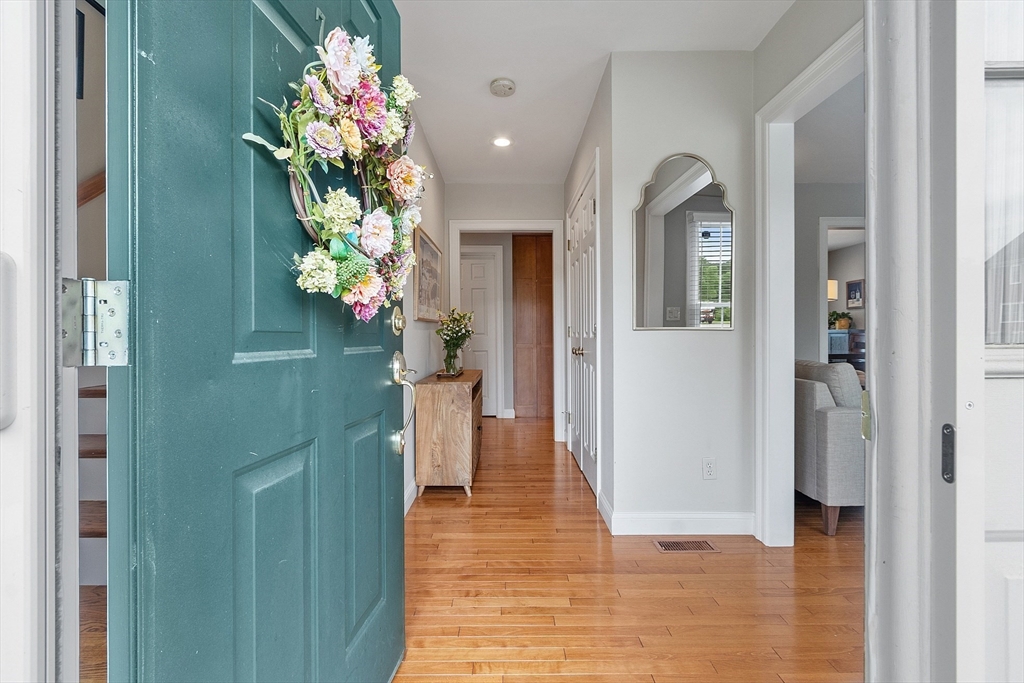 35 Lancaster County Road, Unit 7C Harvard, MA 01451 - Photo 3 of 33 a view of a hallway with wooden floor