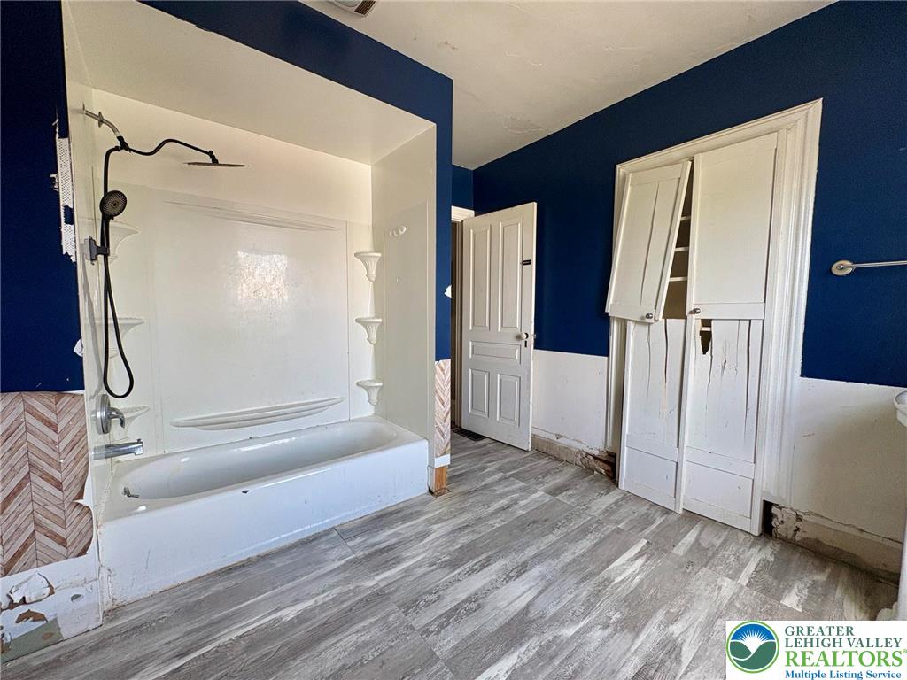 2879 Cemetery Street Slatington, PA 18080 - Photo 15 of 20 a bathroom with a bathtub and a shower