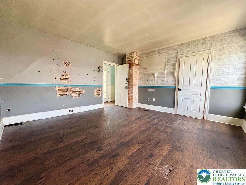 2879 Cemetery Street Slatington, PA 18080 - Photo 17 of 20 a view of a hallway with wooden floor and cabinet