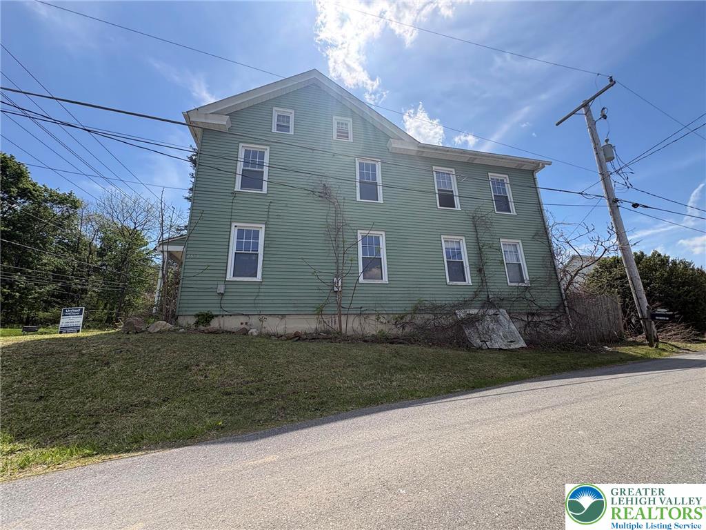 2879 Cemetery Street Slatington, PA 18080 - Photo 3 of 20 front view of a house with a yard
