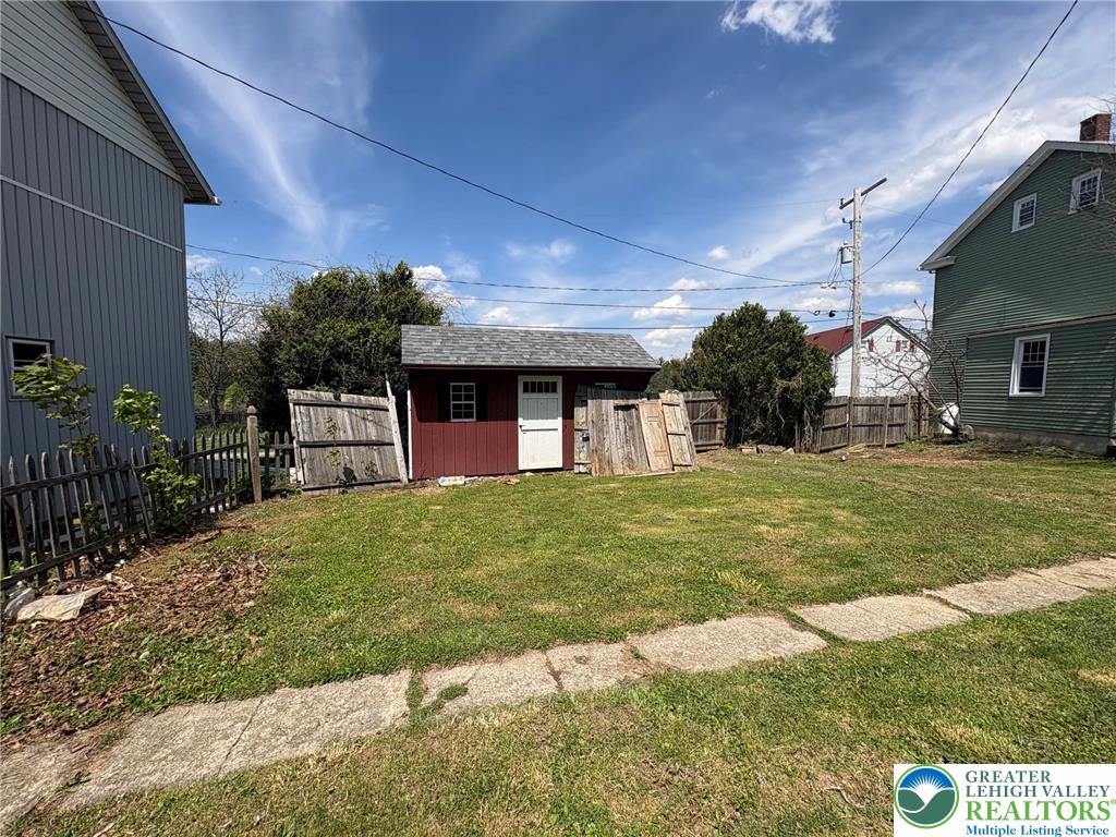 2879 Cemetery Street Slatington, PA 18080 - Photo 6 of 20 a view of a house with a backyard porch and sitting area