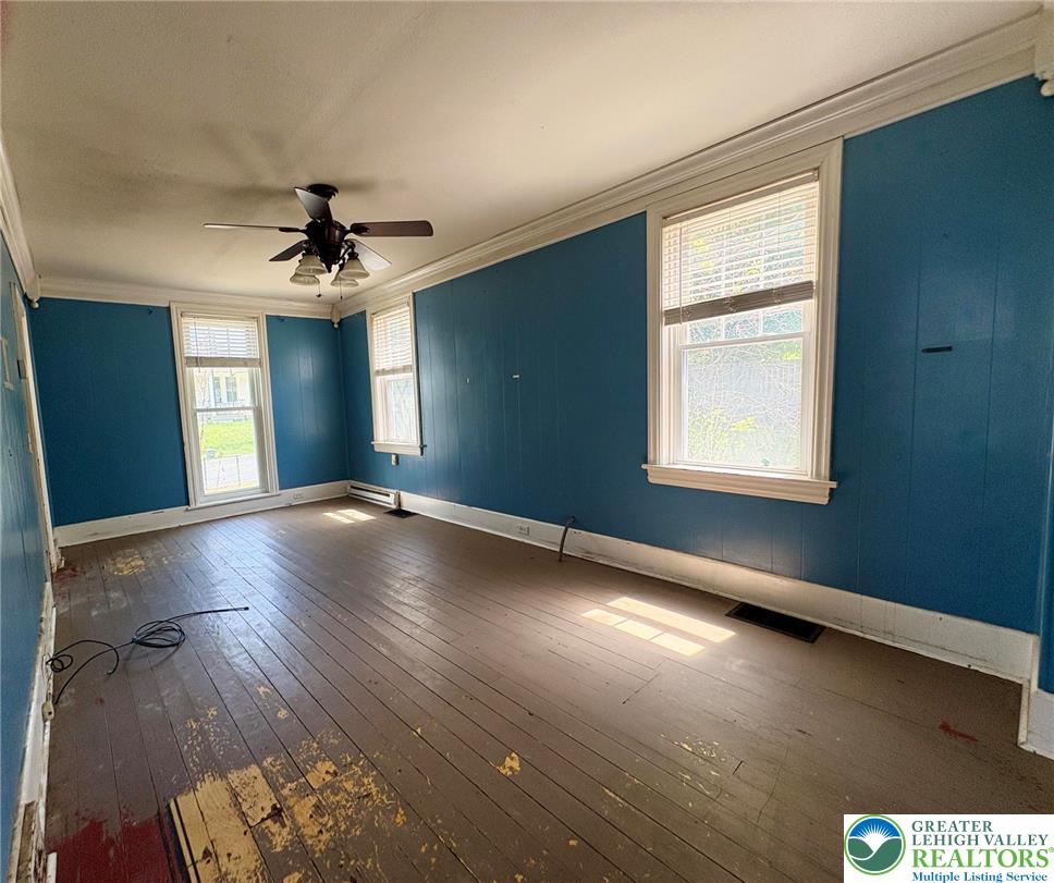 2879 Cemetery Street Slatington, PA 18080 - Photo 10 of 20 a view of an empty room with window and wooden floor