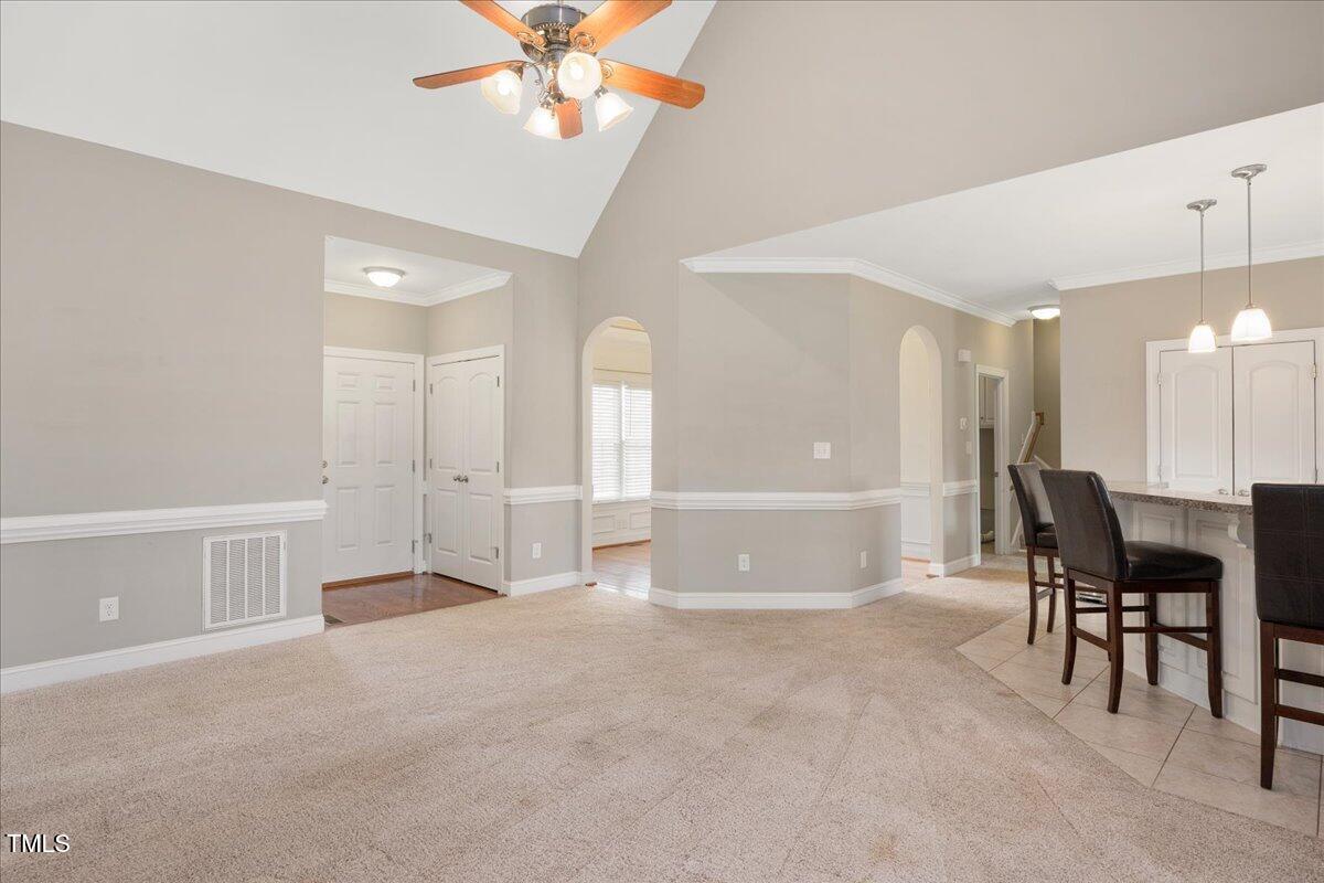 7326 Red Fox Road Bailey, NC 27807 - Photo 10 of 26 a view of a livingroom with a furniture and chandelier fan