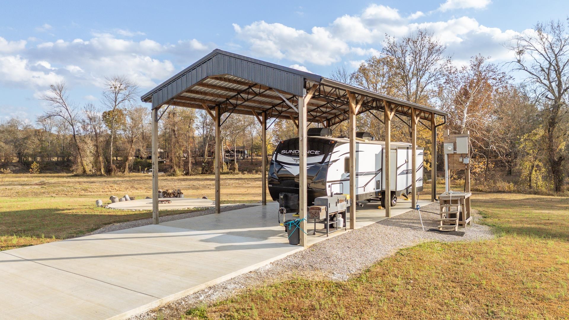 6425 Cravens Road Savannah, TN 38372 - Photo 1 of 39 a view of a building with a outdoor space