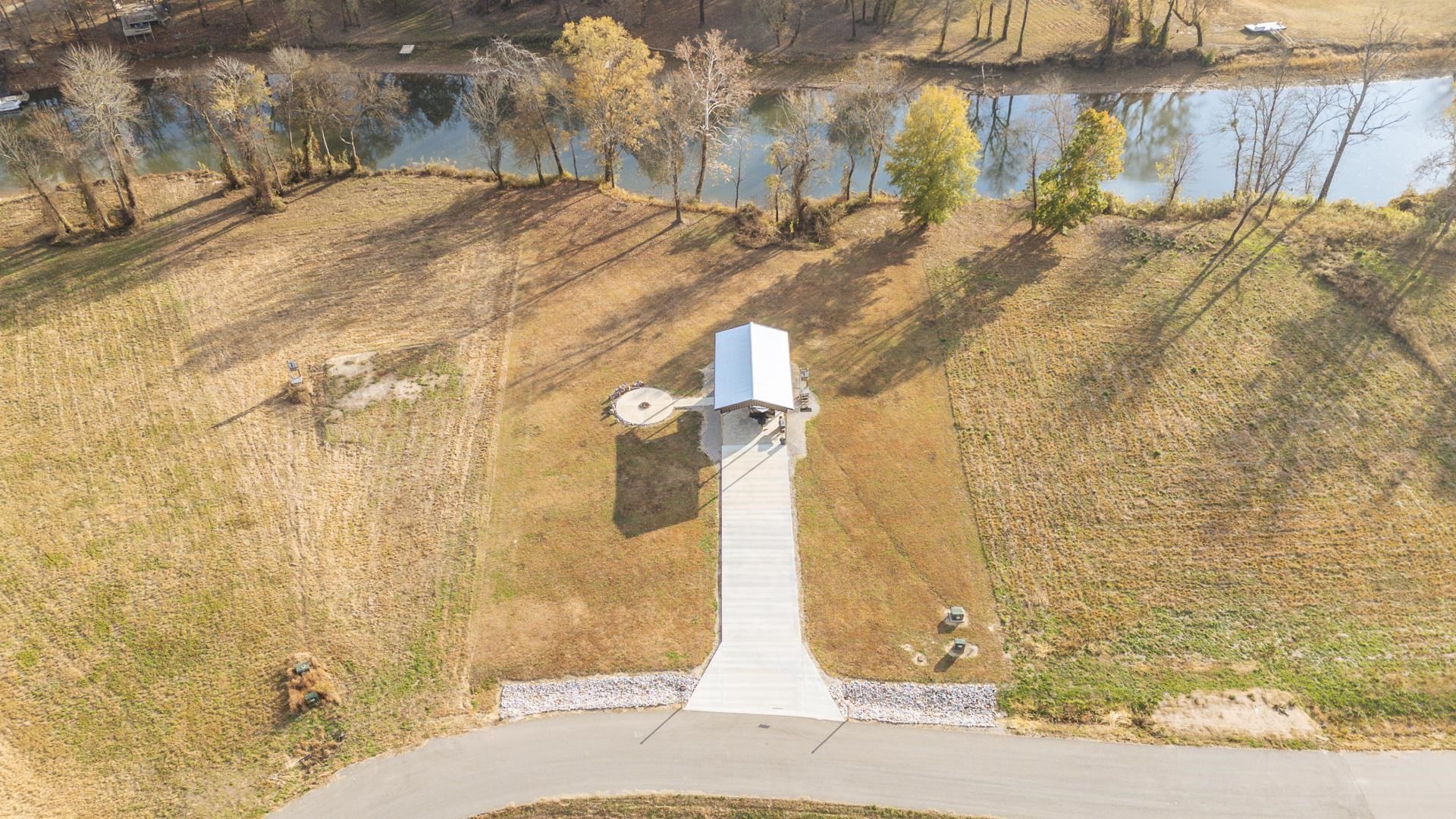6425 Cravens Road Savannah, TN 38372 - Photo 13 of 39 a bathroom with a granite countertop shower and a sink