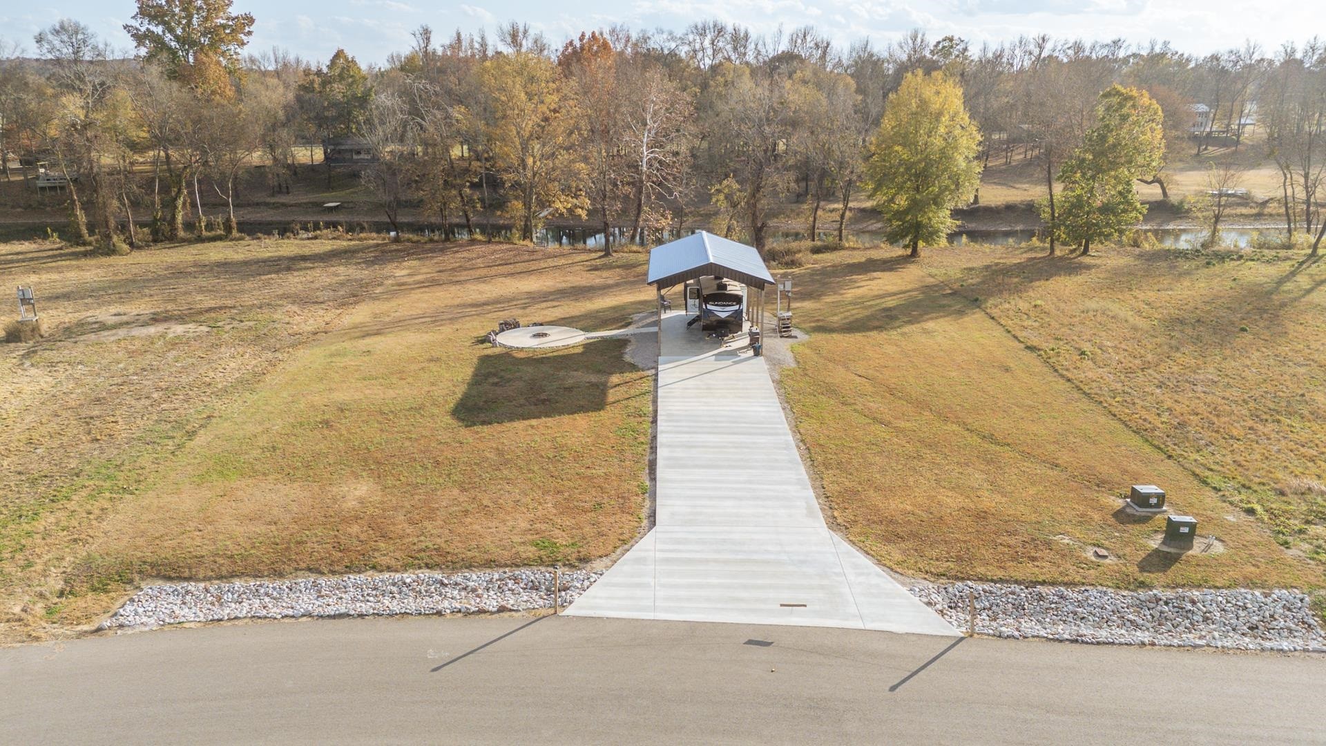 6425 Cravens Road Savannah, TN 38372 - Photo 19 of 39 a view of a swimming pool with an outdoor space