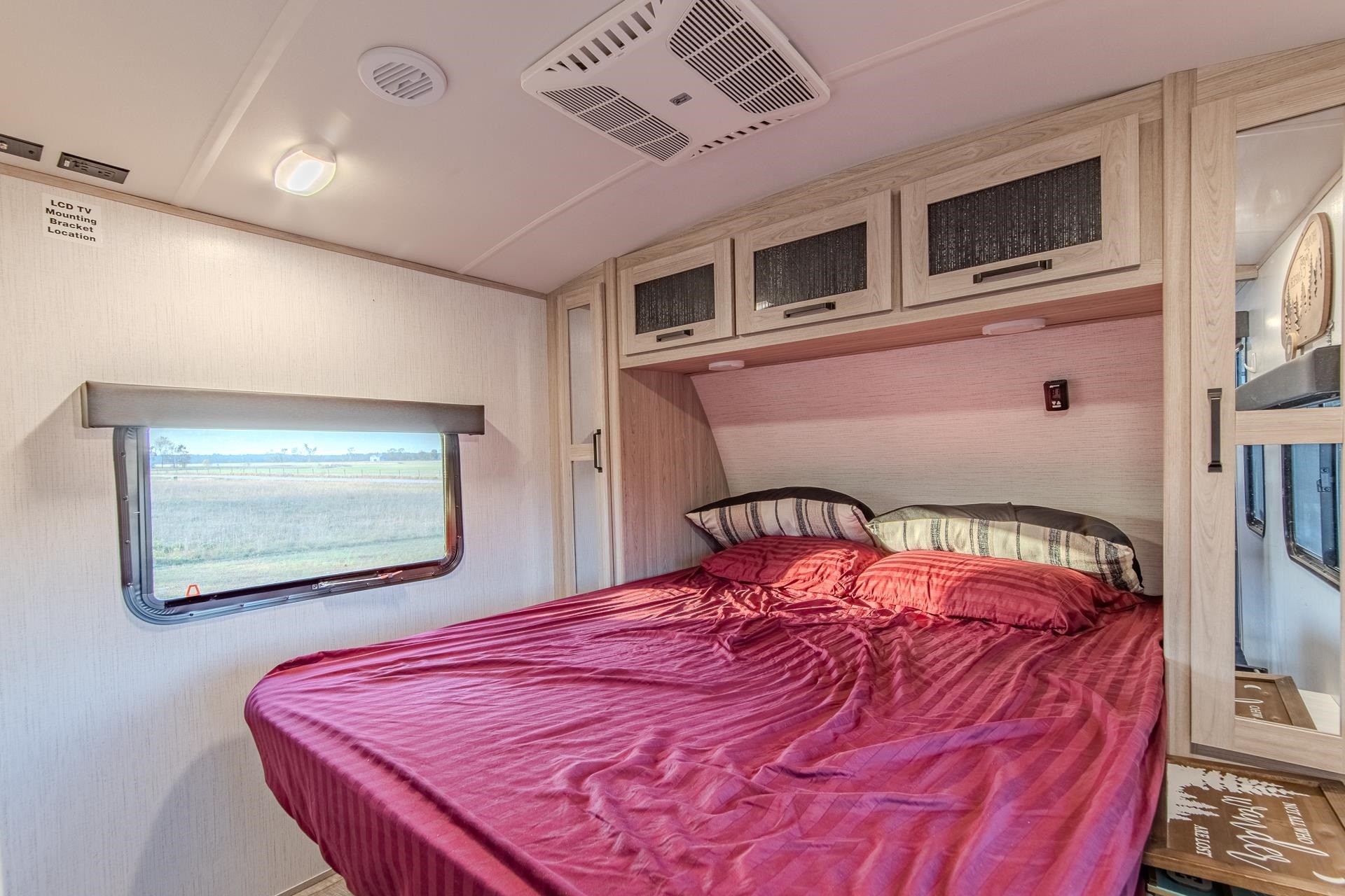 6425 Cravens Road Savannah, TN 38372 - Photo 29 of 39 a bed sitting in a bedroom next to a window