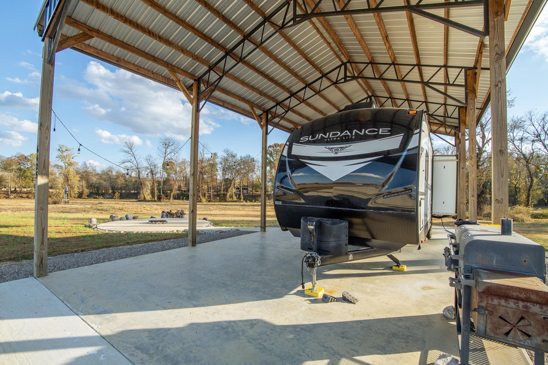 6425 Cravens Road Savannah, TN 38372 - Photo 30 of 39 a view of a swimming pool with a lounge chair
